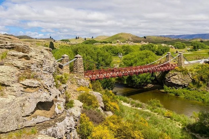 Travel 58 kilometres inland from Dunedin to Pukerangi on a heritage train. The route crosses historic viaducts and passes through hand-carved tunnels.